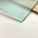 Frosted Glass Look Acrylic. Frosted side features a textured matte feel.